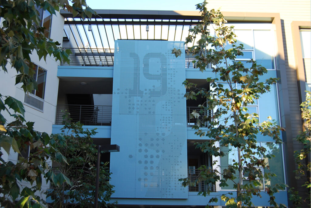 Picture PERFect graphic panel, made using perforated aluminum, providing wayfinding and for dormitory number.