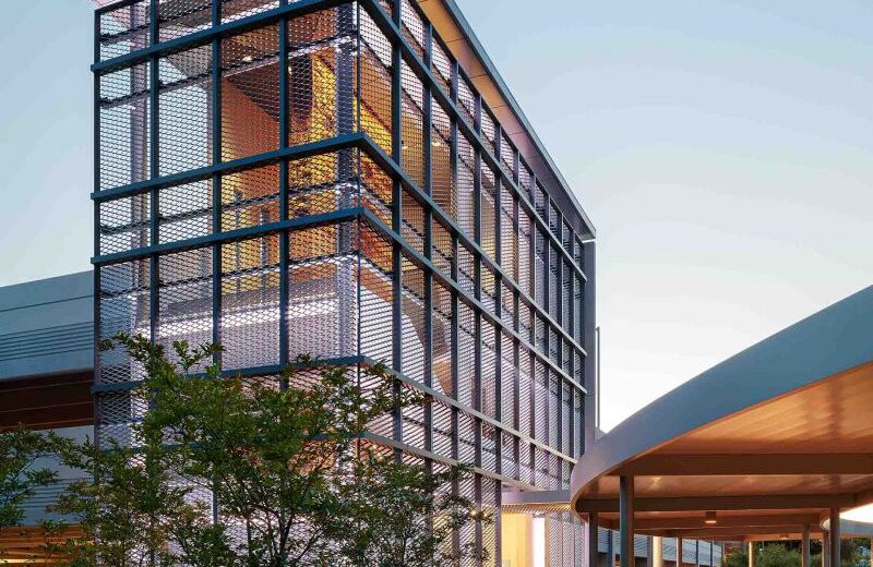 Expanded mesh parking garage screen designed to enhance the beauty of a parking structure